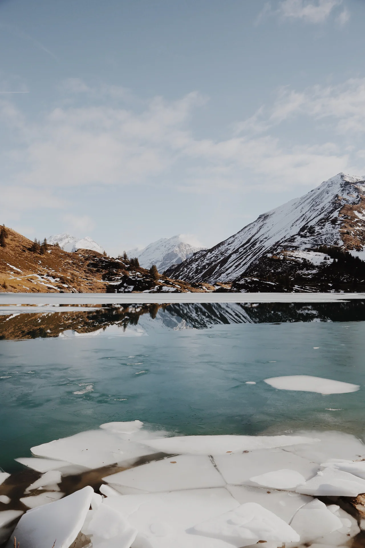 Trübsee lake and mountain reflections