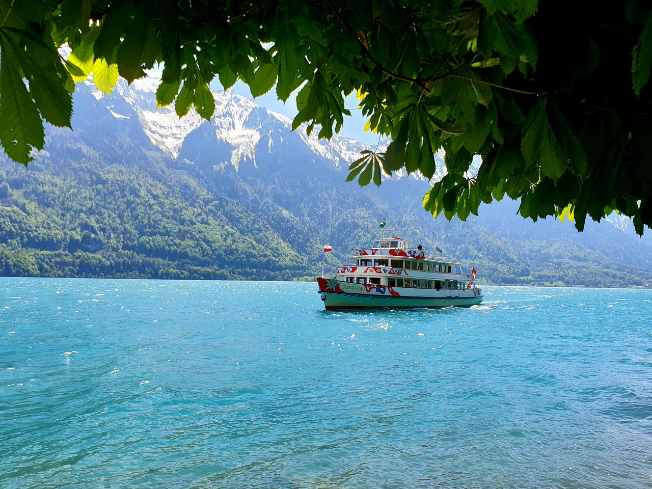 Passenger boat approaching Niederried on Lake Brienz